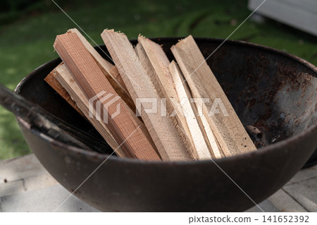 Fire pit, firewood, camping, outdoor, fire starting, barbecue, camping equipment, bonfire preparation, wood Fire pit, firewood, camping, outdoor, fire starting, barbecue, camping equipment, bonfire preparation, wood 141652392