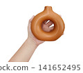 A modern-style brown vase is in a man's hands against a white background. 141652495
