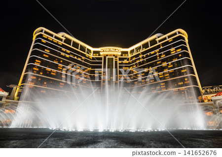 Beautiful night view of Wynn Palace Performance Lake displays a water, music, and light show, is a hotel casino resort on the Cotai Strip in Macau, China. Beautiful night view of Wynn Palace Performance Lake displays a water, music, and light show, is a hotel casino resort on the Cotai Strip in Macau, China. 141652676