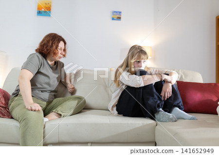 Mother and daughter having conflict over problems and stress Mother and daughter having conflict over problems and stress 141652949