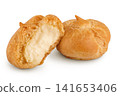 profiterole with cream isolated on a white background 141653406