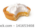 bitten off tartlet with lemon cream and meringue isolated on white background 141653408