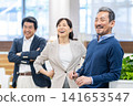 Middle-aged businessman working in an office. Photo courtesy of Denpa Gakuen, Tokyo Electronics College. 141653547