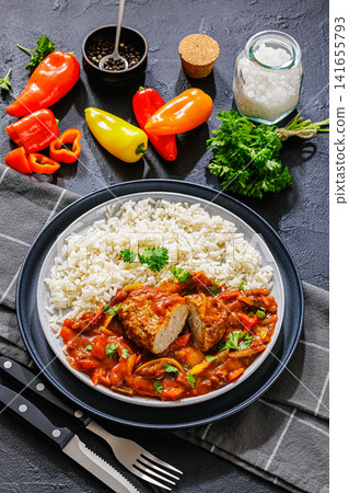 German Frikadelle in Sweet Pepper Lecho With Rice German Frikadelle in Sweet Pepper Lecho With Rice 141655793