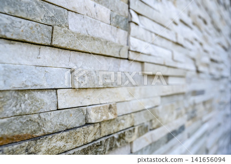 Improved texture of exterior walls clad in white stone-pattern siding in Tokyo Improved texture of exterior walls clad in white stone-pattern siding in Tokyo 141656094