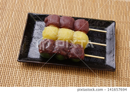 Delicious skewers of dumplings Delicious skewers of dumplings 141657694