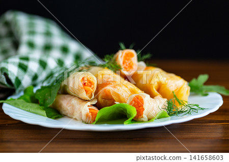 Healthy Korean cabbage appetizer with marinated vegetable filling Healthy Korean cabbage appetizer with marinated vegetable filling 141658603