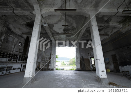 The geometric arrangement of columns and the sense of depth create a ruined interior. The geometric arrangement of columns and the sense of depth create a ruined interior. 141658711