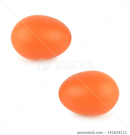 Two fresh brown chicken eggs isolated on plain white background. Two fresh brown chicken eggs isolated on plain white background. 141659111