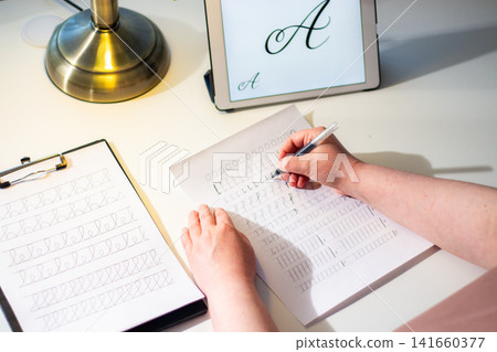 Writing on paper with pen. Handwriting as investment in cognitive reserve and brain fitness. Writing by hand forces brain to synthesize information and prevents against mental decline Writing on paper with pen. Handwriting as investment in cognitive reserve and brain fitness. Writing by hand forces brain to synthesize information and prevents against mental decline 141660377