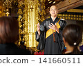 A monk speaking to the attendees A monk speaking to the attendees 141660511