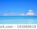The tropical scenery of Ishigaki Island, with its endless blue sky and crystal-clear emerald green sea. 141660618