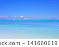 The tropical scenery of Ishigaki Island, with its endless blue sky and crystal-clear emerald green sea. 141660619