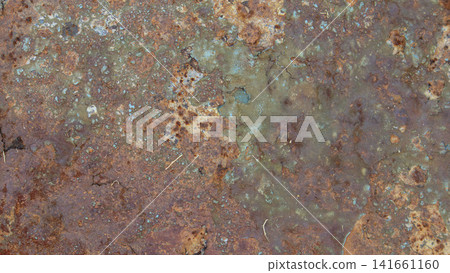 Abstract background texture of corroded metal surface with rusty patina and flaking blue paint 141661160