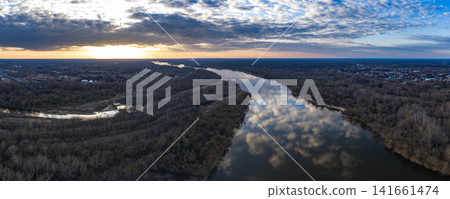 Aerial panorama of Vistula River near Warsaw at winter sunset Aerial panorama of Vistula River near Warsaw at winter sunset 141661474