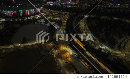 Aerial night view of Warsaw PGE Narodowy and Vistula River Aerial night view of Warsaw PGE Narodowy and Vistula River 141661524