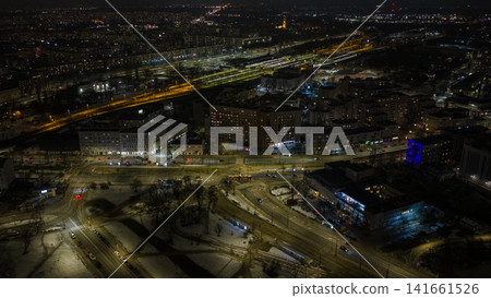 Nighttime aerial Warsaw Praga with snowy tram lines and Wschodnia tracks Nighttime aerial Warsaw Praga with snowy tram lines and Wschodnia tracks 141661526