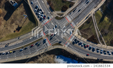 Aerial X shaped intersection in Warsaw with bike lanes and stops Aerial X shaped intersection in Warsaw with bike lanes and stops 141661534