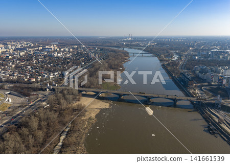 Aerial winter view of Warsaw, Vistula River, Poniatowski Bridge Aerial winter view of Warsaw, Vistula River, Poniatowski Bridge 141661539