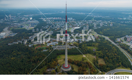 Vilnius Television Tower Amidst Greenery and Urban Landscape Vilnius Television Tower Amidst Greenery and Urban Landscape 141661574