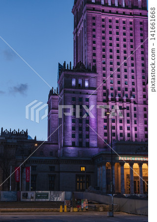 Palace of Culture and Science in Warsaw Lit with Purple at Twilight 141661668