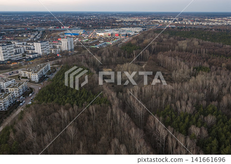 Aerial view of Warsaw suburb where forest meets urban expansion Aerial view of Warsaw suburb where forest meets urban expansion 141661696