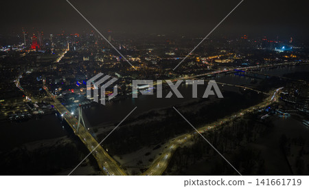 Aerial night view of Warsaw, Vistula River and Swietokrzyski Bridge Aerial night view of Warsaw, Vistula River and Swietokrzyski Bridge 141661719