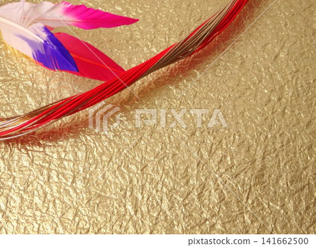 Gold washi paper, feathers, and mizuhiki (decorative cords). Gold washi paper, feathers, and mizuhiki (decorative cords). 141662500