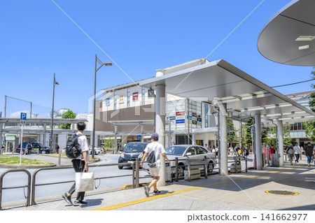 Urban scenery in Shinagawa Ward, Tokyo: Bus rotary and taxi stand in front of Musashi-Koyama Station 141662977