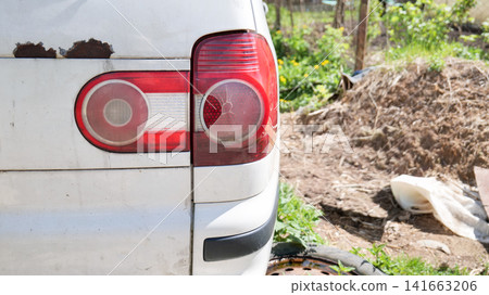 Broken Rear Tail Light on Car Broken Rear Tail Light on Car 141663206