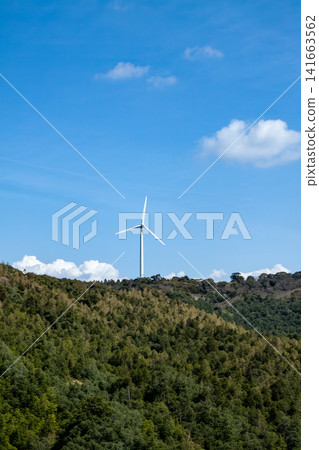 Wind turbines installed on top of a mountain Wind turbines installed on top of a mountain 141663562