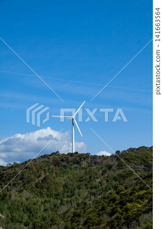 Wind turbines installed on top of a mountain Wind turbines installed on top of a mountain 141663564