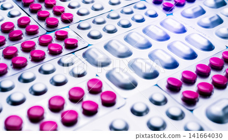 Pharmaceutical tablets and blister packs. Prescription medication, healthcare treatment, pharmacy products, clinical research, and modern medicine concept. Prescription medicine, healthcare services. 141664030