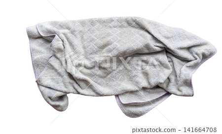 Crumpled used grey fabric towel or cloth. Isolated against a clean white background. Strands of hair stuck to it. Showing soft folds and texture. With Clipping path. Crumpled used grey fabric towel or cloth. Isolated against a clean white background. Strands of hair stuck to it. Showing soft folds and texture. With Clipping path. 141664708