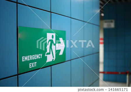 Emergency exit sign in a subway station 141665171