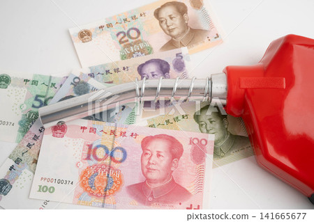 Gas pump, Fuel Nozzle with banknote money for cost energy. 141665677