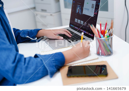 Teenage using tablet for communication, search data internet website to learn. Teenage using tablet for communication, search data internet website to learn. 141665679