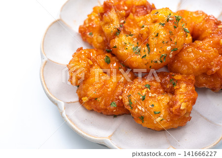 Crispy fried chili shrimp tossed in sweet and spicy sauce, Asian Chinese food style Crispy fried chili shrimp tossed in sweet and spicy sauce, Asian Chinese food style 141666227