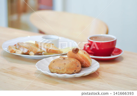 bread, bun or cranberry bread or cranberry bun or cranberry bagel and donut or doughnut with hot cocoa and sourdough bread, bun or cranberry bread or cranberry bun or cranberry bagel and donut or doughnut with hot cocoa and sourdough 141666393