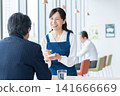 A middle-aged woman working at a cafe. Photography assistance provided by: Denpa Gakuen Educational Foundation, Tokyo Electronics College. 141666669