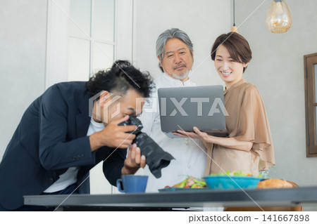 A team taking menu photos at a restaurant. A team taking menu photos at a restaurant. 141667898