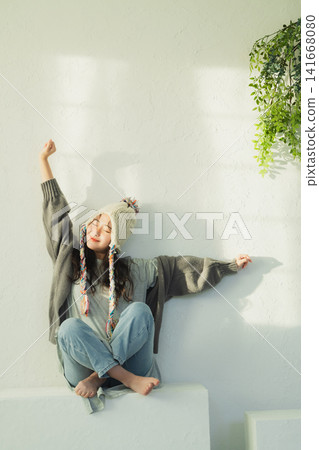 一位戴著針織帽的女士的肖像 一位戴著針織帽的女士的肖像 141668080