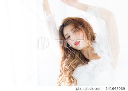 A woman wearing colored contact lenses A woman wearing colored contact lenses 141668089