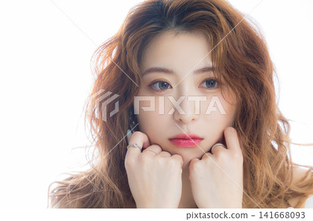 A woman wearing colored contact lenses A woman wearing colored contact lenses 141668093