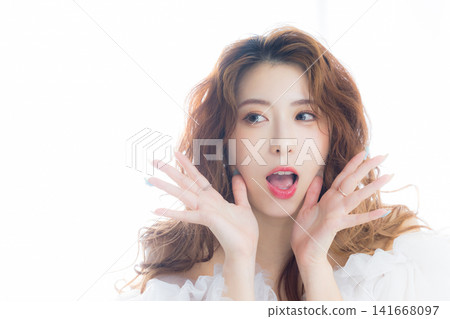 A woman wearing colored contact lenses A woman wearing colored contact lenses 141668097