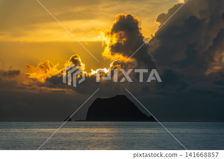 Sunrise over Keelung Islet in Wanli, Taiwan Sunrise over Keelung Islet in Wanli, Taiwan 141668857
