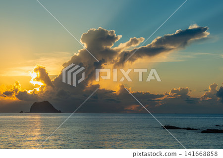 Sunrise over the ocean in Wanli, New Taipei City Sunrise over the ocean in Wanli, New Taipei City 141668858