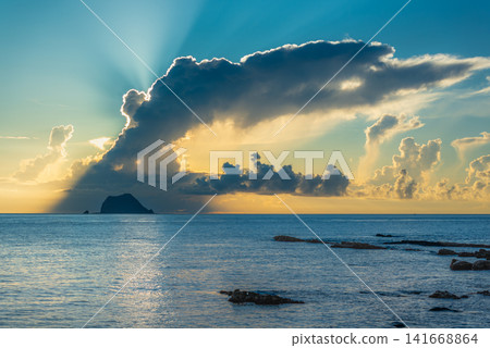 Sunrise over the ocean in Wanli, Taiwan Sunrise over the ocean in Wanli, Taiwan 141668864