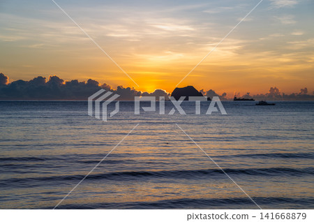 Golden Sunrise Over Keelung Islet in Wanli, Taiwan Golden Sunrise Over Keelung Islet in Wanli, Taiwan 141668879