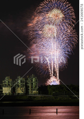 Fireworks and factory night view Fireworks and factory night view 141669078